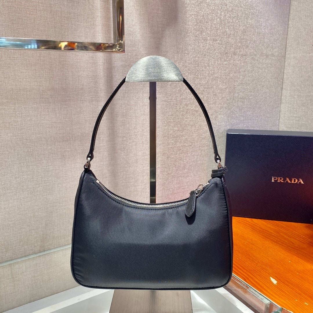 Bolsa Prada mini Re-Edition 2000