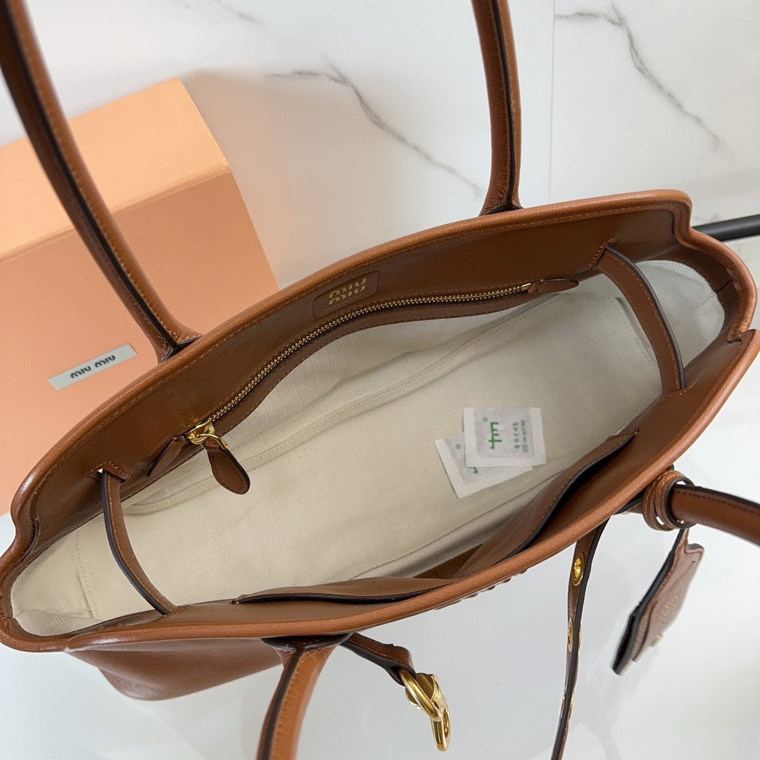 Bolsa Miu Miu Aventure Carvalho