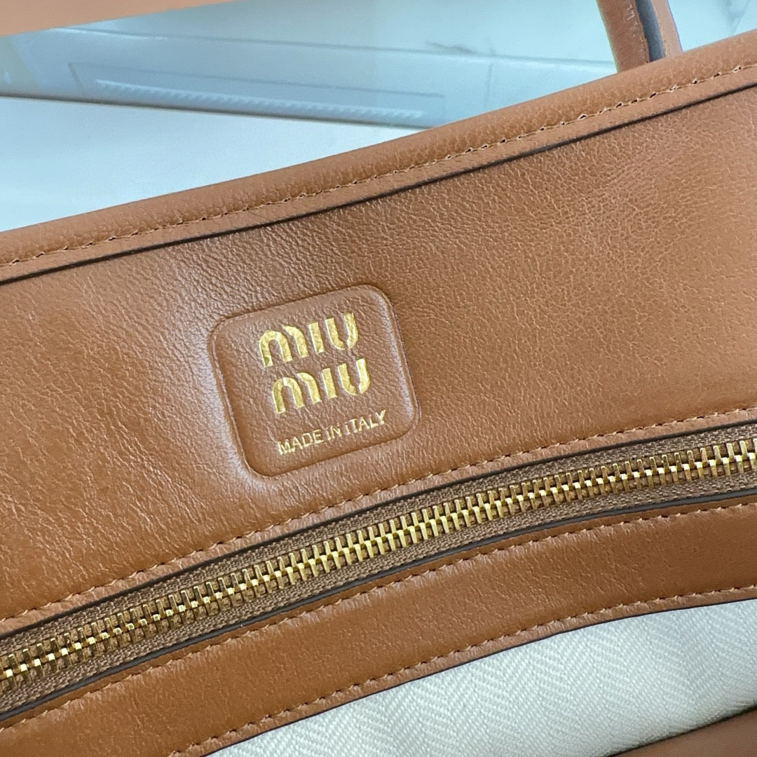 Bolsa Miu Miu Aventure Carvalho