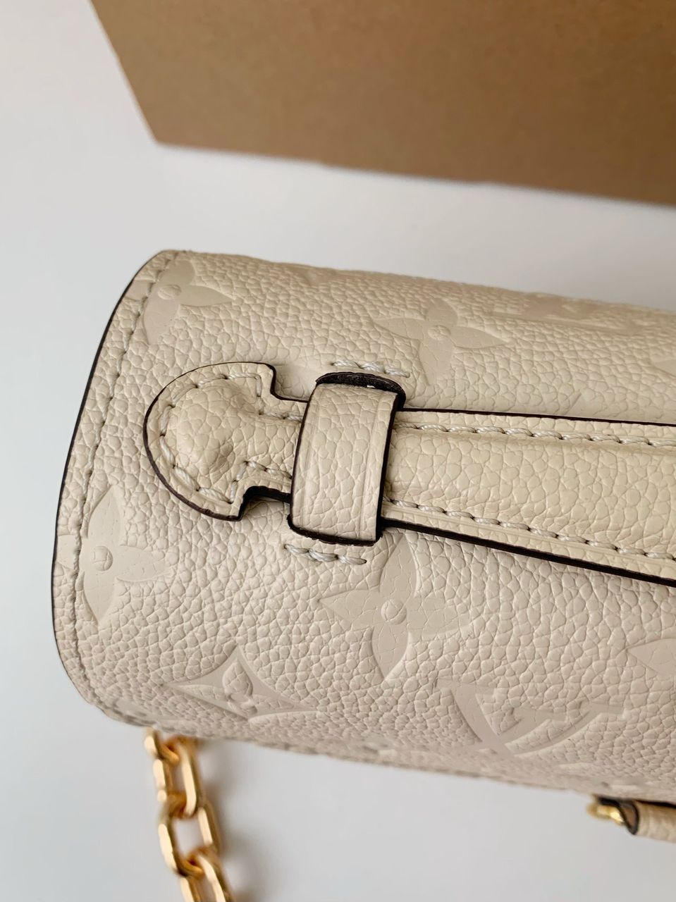 Pochette Métis East West Monogram Empreinte Cream