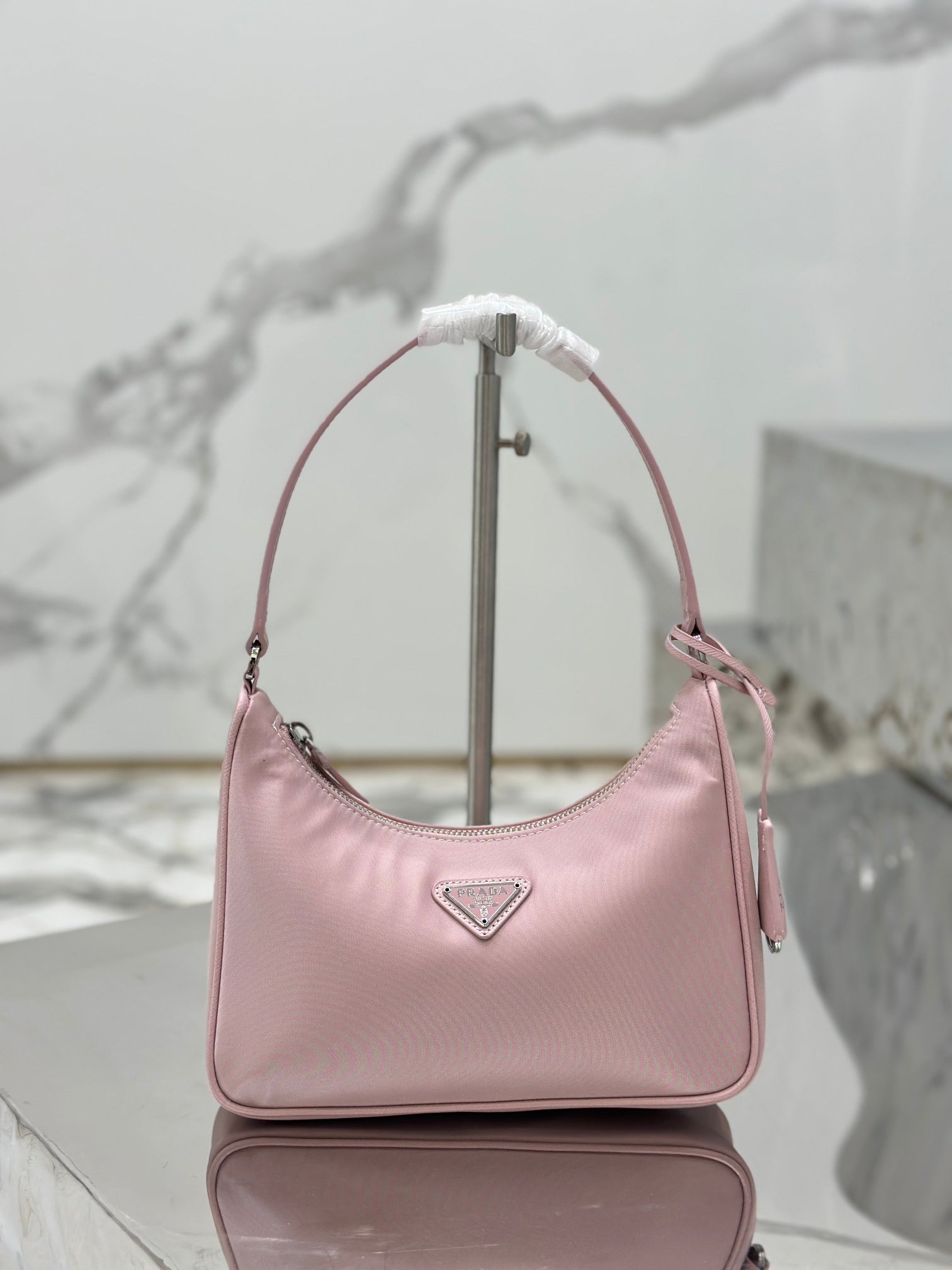 Bolsa Prada mini Re-Edition 2000