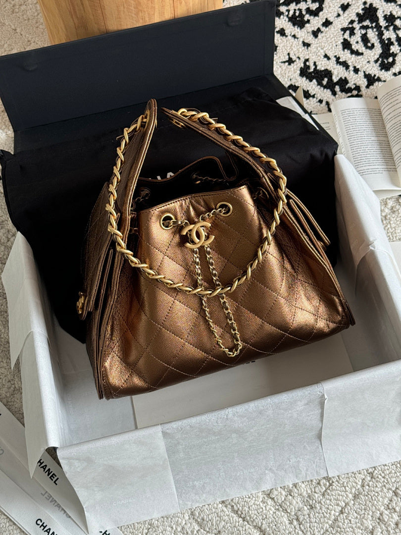 Bolsa Hobo Chanel 25 Bronze