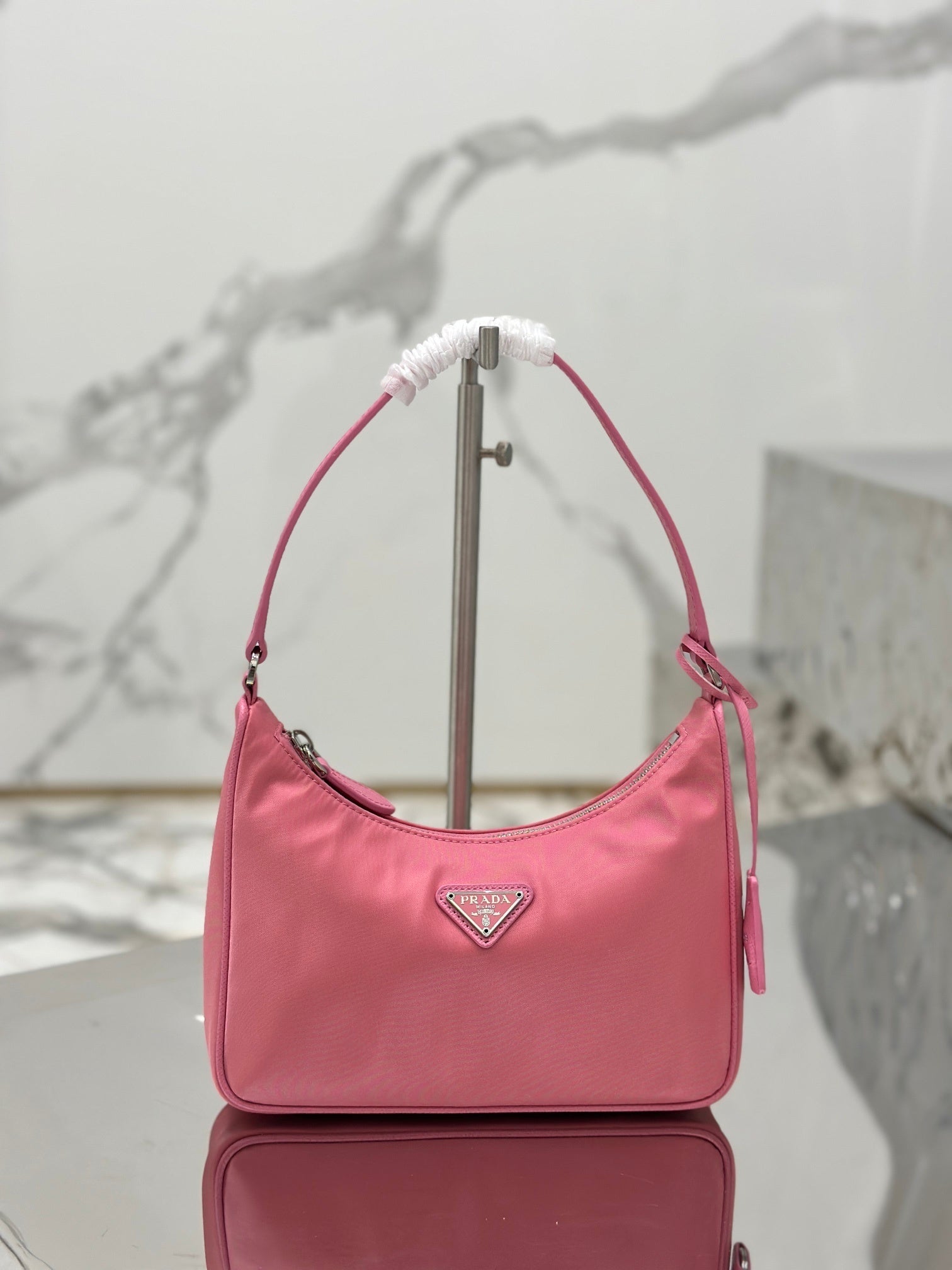 Bolsa Prada mini Re-Edition 2000