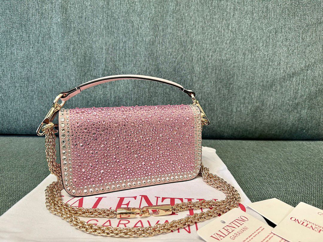 Valentino Garavani Locò Shoulder Bag With Rhinestones.