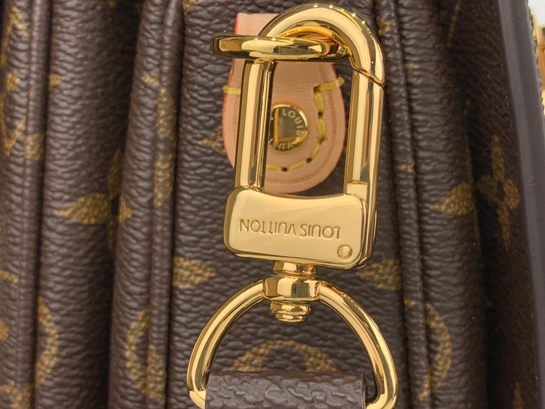 Pochette Métis East West Monogram Canvas Brown